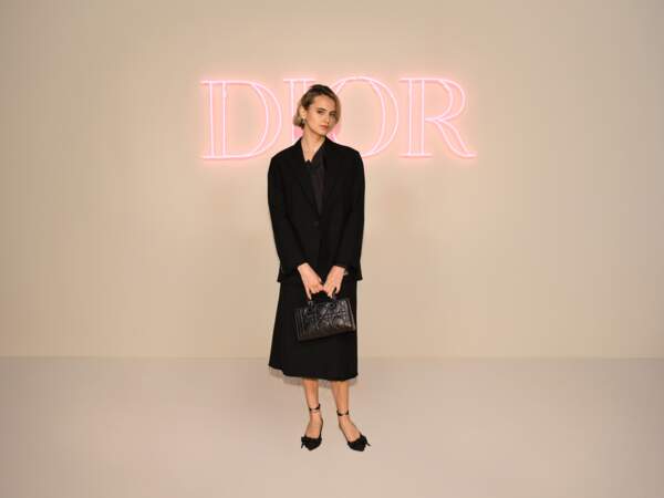 Violette d'Urso en veste en laine et soie noire au défilé Dior Fall 2024